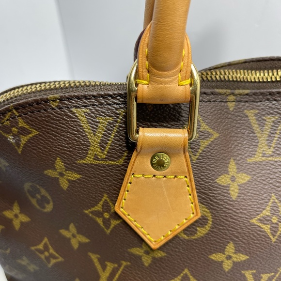 Loui Vuitton Alma in Monogram, with dust bag. - Picture 9 of 16